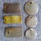 Wisconsin trap tags 1927, 1929, 1935, 1937 to 1940.