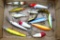 Collection of fishing lures include Rapala Finland, Rebel Fastrac, Rattl'n Rap, more. Largest is
