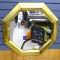 Octagon mirror with brass frame is 24