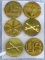 Six US military pins. Insignias include Field Artillery, Calvary, Aviation, Air Defense Artillery,