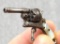 Miniature antique 2mm rimfire double action revolver with mother-of-pearl grips, tasteful engraving.