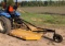 Watch the video.  Farm Force brush hog with 5' deck.