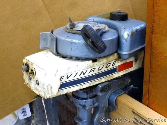 Vintage Evinrude Mate outboard motor with rope start, pulls over, 6" prop, and measures approx. 8" x