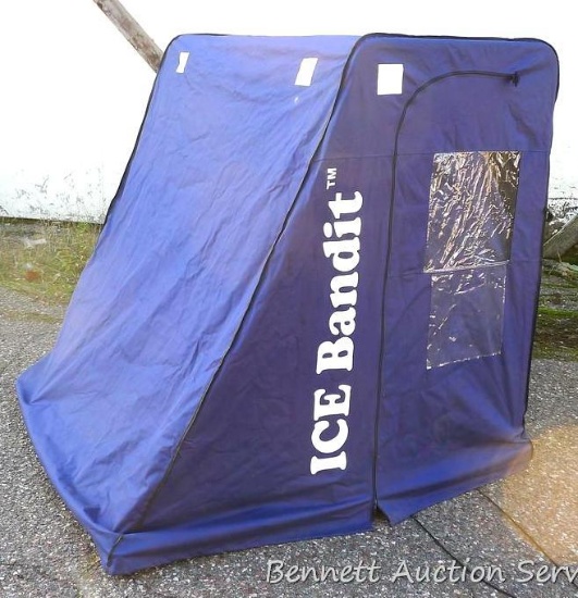Portable Ice Bandit ice fishing shack is about 61" x 36" across base.