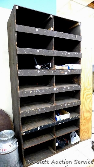 Wooden storage bin is 48" x 96" x 24" deep. Storage compartments measure 23" wide x approx. 9" tall.