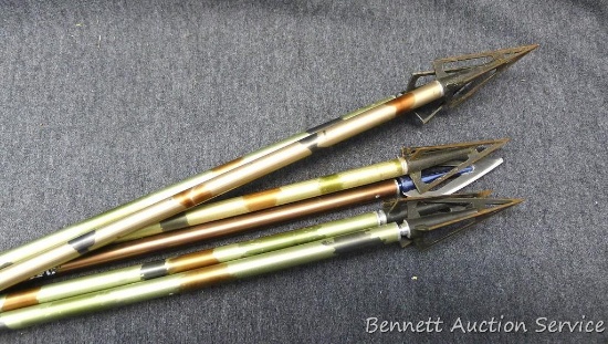 Six camo crossbow bolts 22-1/4" long, includes Eastern XX75. All have broadheads.