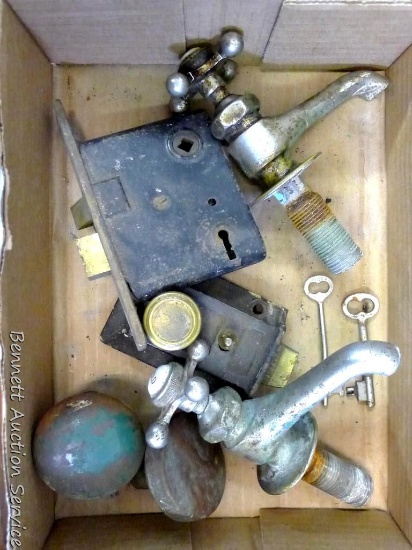 Antique faucets, door latch, door knobs. Includes two skeleton keys. Largest faucet is approx 6" x
