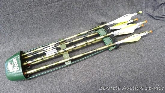 Bear quiver with 6 camo aluminum Eastern XX75 2219 arrows 21" long. Includes field points and