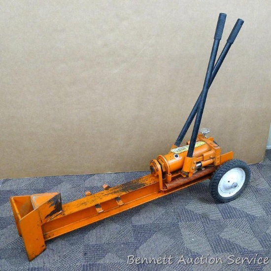 Astroline 10 ton portable log splitter is model 1000. Measures approx 46" long and has a dual action