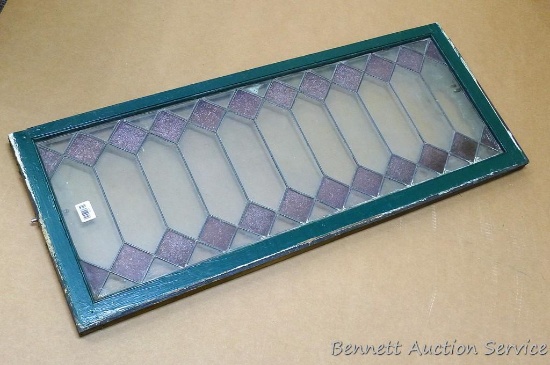 Beautiful stained glass window is about 4' x 1-1/2'. Matches lot 195