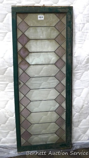Cute stained glass window is about 4' x 1-1/2'. Matches lot 192.