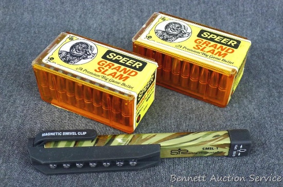 100 Speer Grand Slam premium big game bullets; 30 cal., 180 gr., and .38"; new. Pocket flashlight