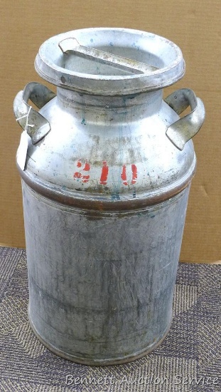 Galvanized milk can is about 14" x 24". In overall good condition, inside looks good.