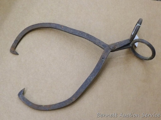 Antique ice tongs open up to about 22".