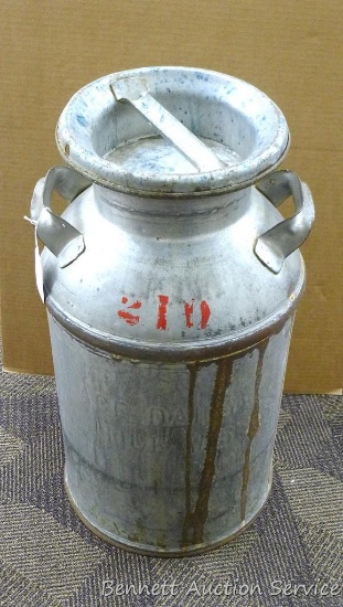 Galvanized milk can is about 14" x 24". In overall good condition, inside looks good.
