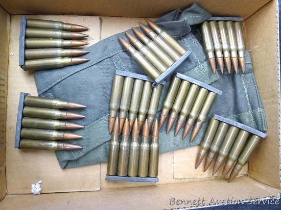 40 rounds 7.62x51 NATO ammunition on stripper clips. Included bandolier denotes 7.62 mm M80.
