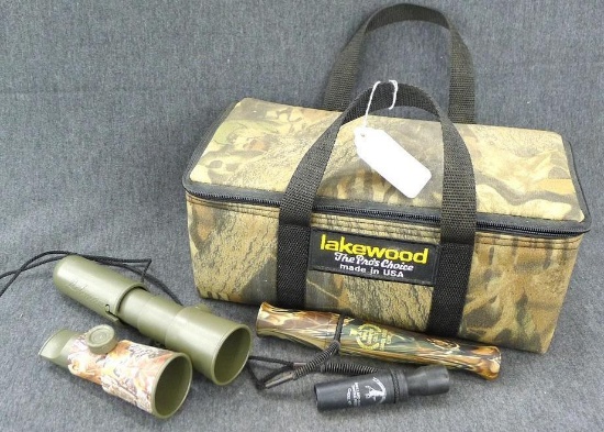 Several calls come in Lakewood carrying case. Duck calls and one goose call, case is approx 13" x 6"
