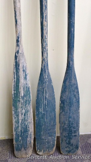 Three oars, longest is about 77" and has oar lock.