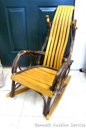 Adorable children's rocker is about 18" x 22" x 32" tall. Wonderful piece would be great in your