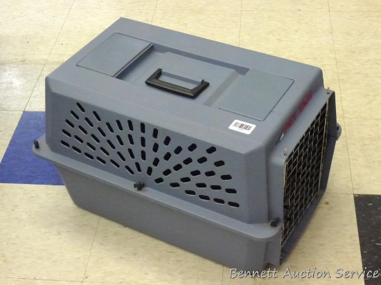 Pet Mate pet kennel is about 23" x 16" x 14". Looks to be in nice shape.