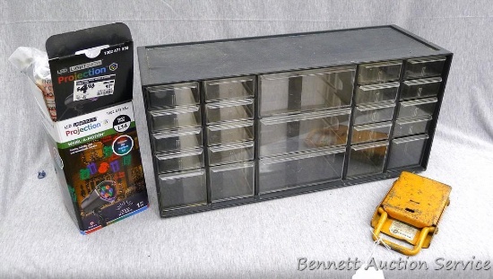 Organizer is 18" x 6-1/2" x 9"; metal wheel chock; and Christmas Projection Whirl-A-Motion, NIB.