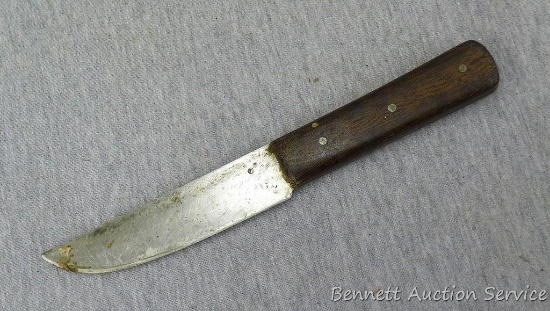 Nice little handmade hunting knife is about 9" long and has a beautiful cloth micarta handle.
