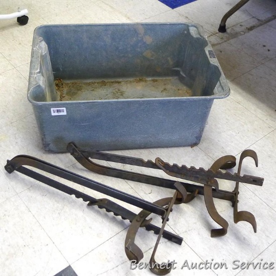 Two roof jacks in a fiberglass tub. Tub is approx 25" x 18" x 10".
