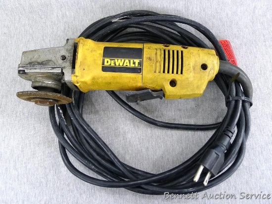 DeWalt 4-1/2" angle grinder is model No DW402, works. Has new cord.