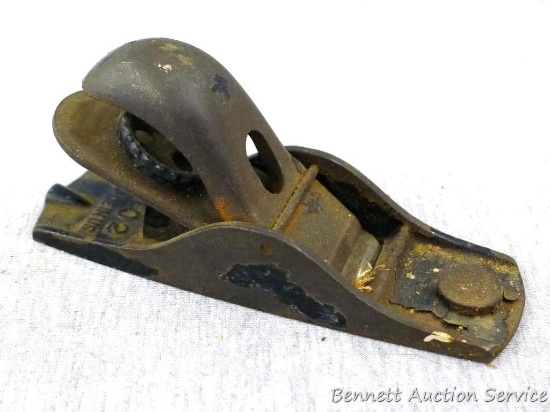Carpenter's apron plane is marked 102, made in USA; measures 5-1/2" x 1-1/2" x 2-1/2".