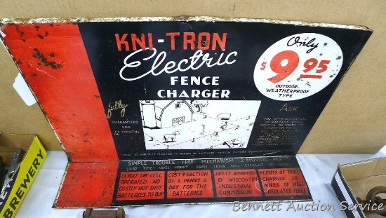 Vintage metal Kni-Tron Electric Fence Charger sign; measures 22" x 14".