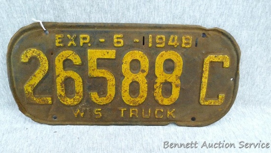 Wisconsin truck license, exp. 1948; measures 13-1/2" x 6".