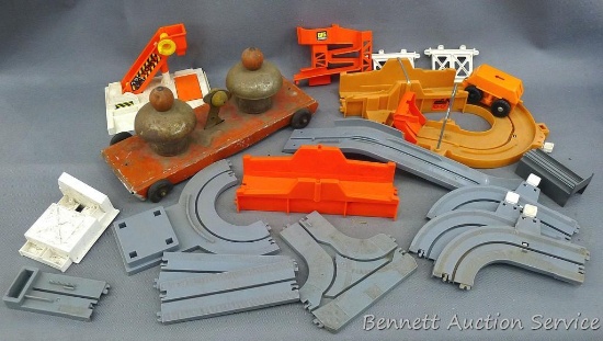 Tomy electric car and track, plus a metal child's pull toy. See pictures. Pull toy is about 11-1/2"