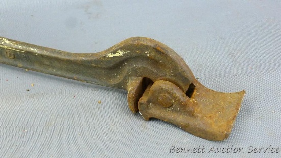 Old cast iron fence puller is approx 19" long and is marked S 5.