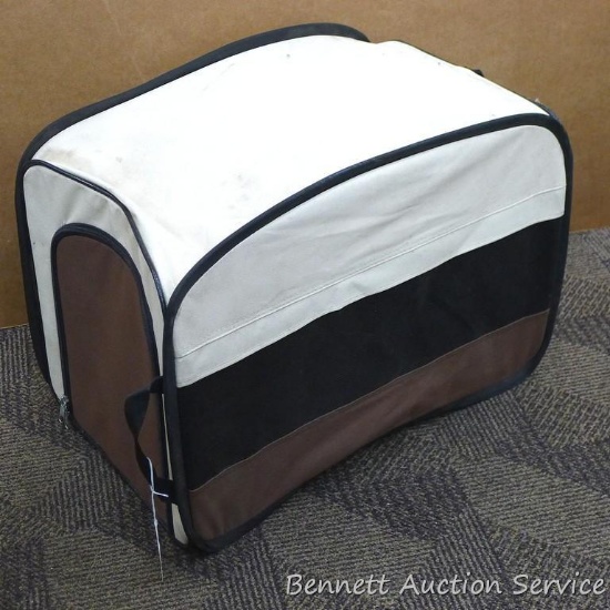 Pet carrier is about 20" x 12" x 16" and could use a cleaning. Small part of side zipper is torn up,