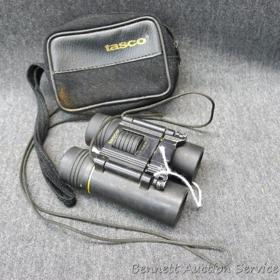 Tasco pocket binoculars 3-1/2" x 3" with cloth carry case.