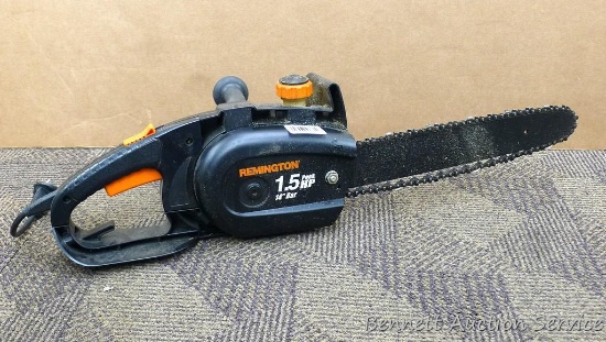 Remington 1.5 hp electric chainsaw, runs. Has a 14" bar.