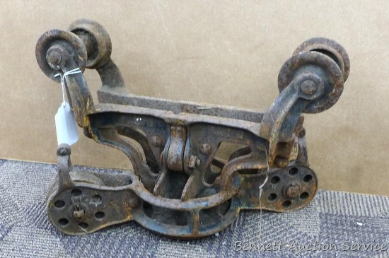 Antique Leader hay trolley is 17" wide.