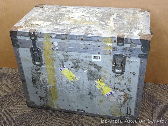 Hard sided footlocker is about 27" x 15" x 21". One latch is missing, dent on bottom, and some wood