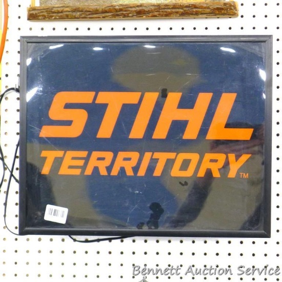 Stihl Territory lighting sign is about 21" x 16", works. See pics for condition.