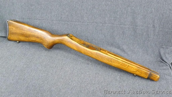 Mystery rifle stock is 29" long, has a wrap-around stainless butt plate and a front cutout for a