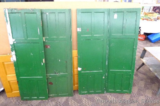 Four door panels; two are about 20" x 58", two are about 18" x 58". Could make a cool project this