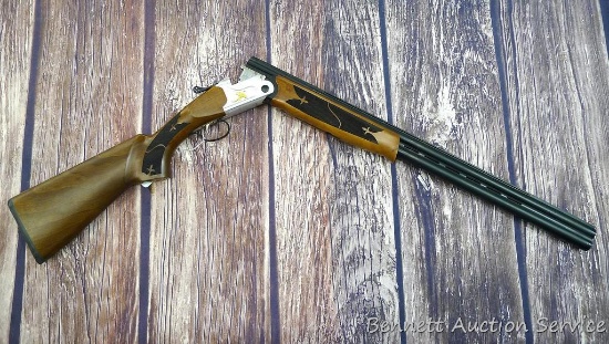 Armscor over-under 12 gauge shotgun with 3" chambers and extractors. 28" barrels have screw-in