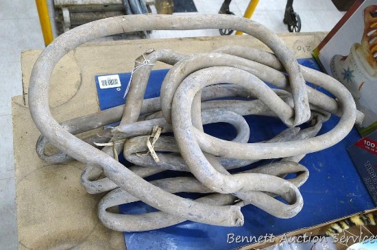 Five pieces of lead pipe weighing 77 lbs.