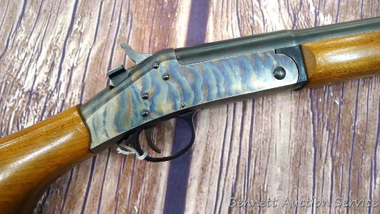 Harrington & Richardson Topper 12 gauge top break shotgun has a beautiful case colored receiver.