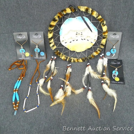 Several Siskiyou Gifts pendant charms, a couple necklaces, and a dream catcher. Dream catcher is