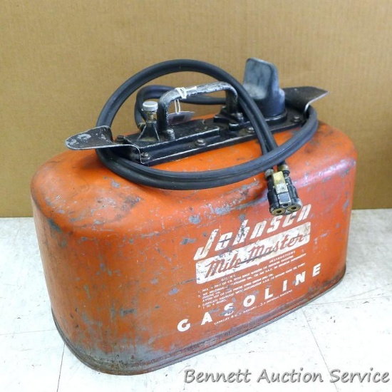 4 gallon Johnson Mile Master outboard motor gas can. Measures approx 17" x 9" x 12'. Has a