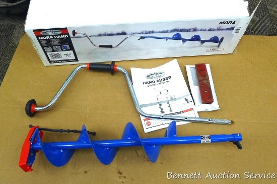 Strike Master Mora hand powered ice auger is model MD-6 and has a 6" wide drill. See pictures.