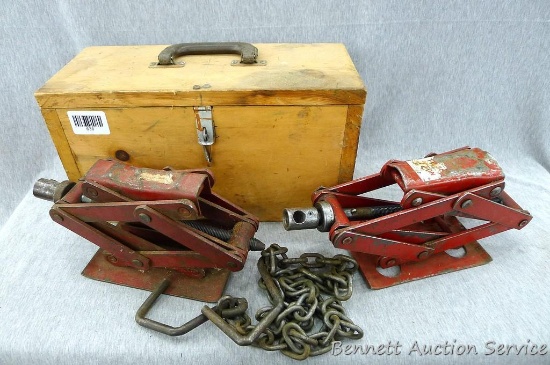 Two scissor jacks are about 11" x 4" x 6" tall. Come with a wooden storage box that holds one jack