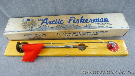 Arctic Fisherman tip-up comes with original box. Measures 23" long, looks to be like new.