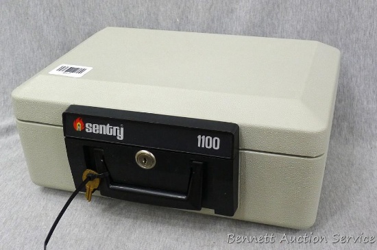 Sentry 1100 fire proof money safe; measures 14" x 10" x 6", looks new and comes with 2 keys.